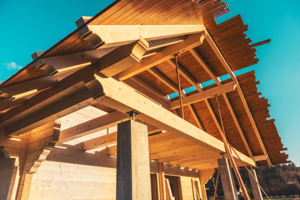 istock Structure of a wooden house under construction 934318464