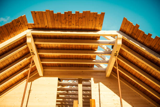 istock Structure of a wooden house under construction 934318746