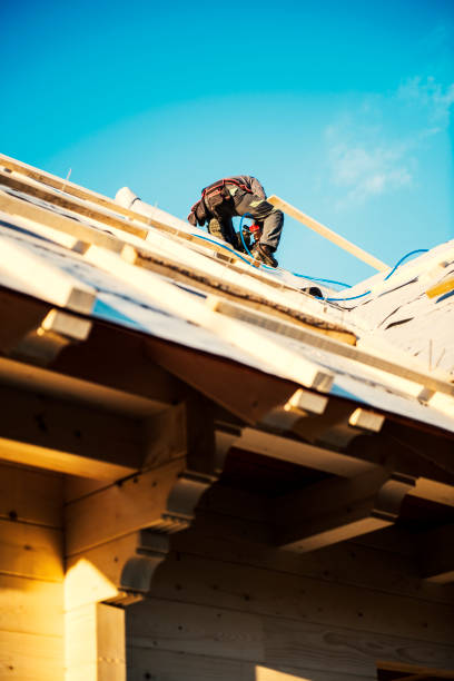 istock Construction roofer nailing wood board with hammer 934318836