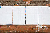 Four real blank billboards on a dilapidated wall