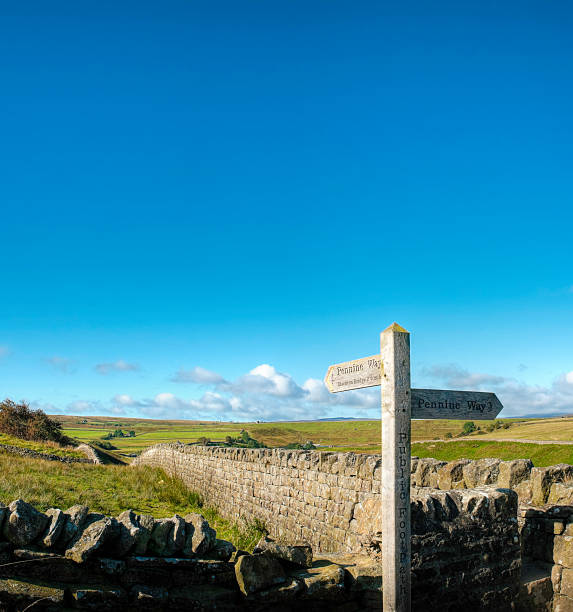 Public footpath sign and big blue sky, Pennine Way, UK  pennines photos stock pictures, royalty-free photos & images