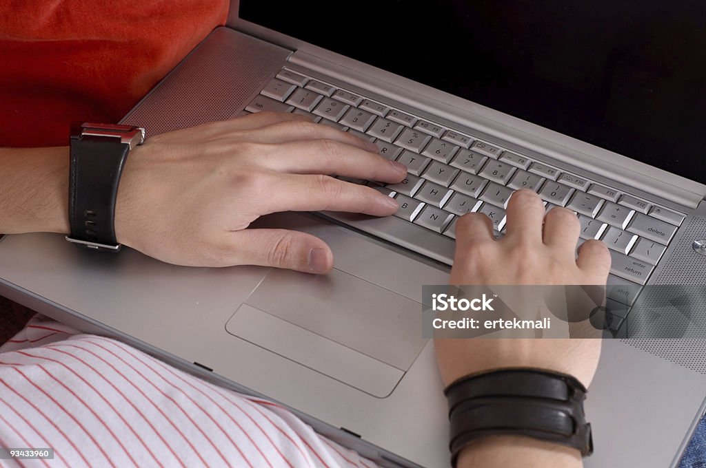 Closeup Casual Man's Hands on Laptop's Keyboard  Adult Stock Photo