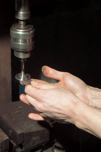 istock Manual grinding of an engine valve 934375072