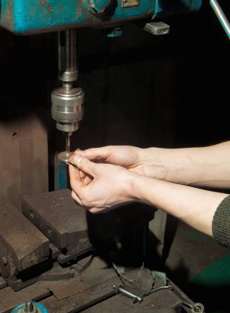 istock Manual grinding of an engine valve 934375078