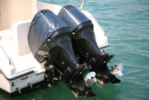 two moored motorboats with outboard motors