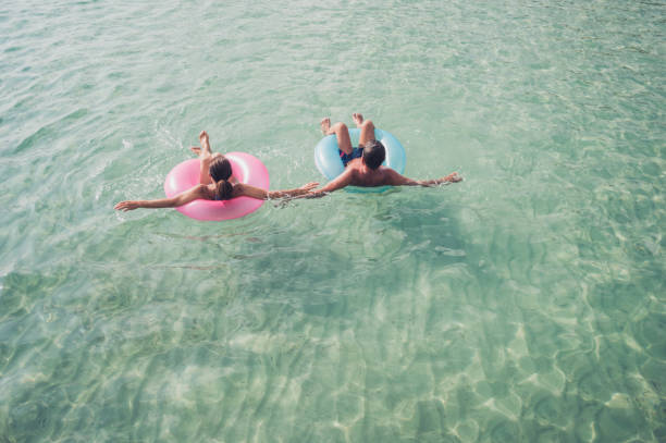 istock Senior couple enjoy sea water 934393594