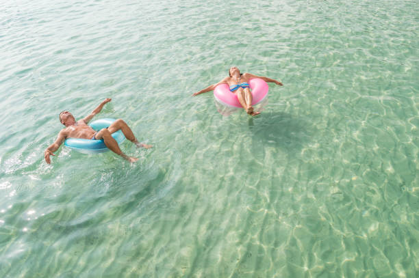 istock Senior couple enjoy sea water 934395828