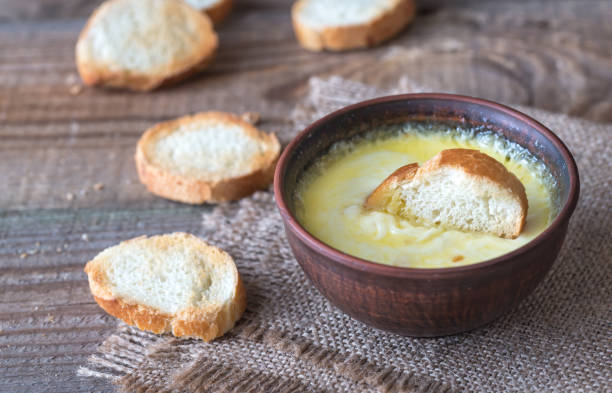 istock Bowl of cheese dip with toasts 934398608