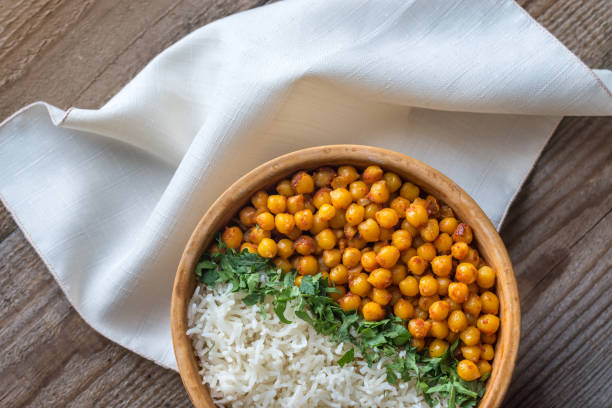 istock Bowl of chickpea curry with white rice and fresh cilantro 934398694