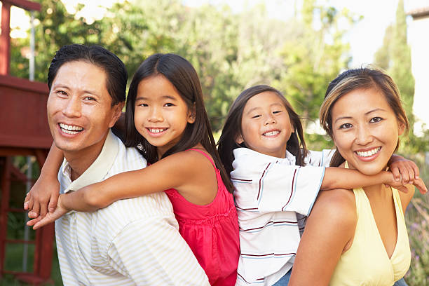 istock Young Family Playing In Garden 93440662