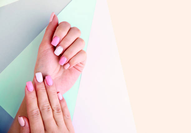 istock Nail design,hands manicure on colorful empty space background. 934408020