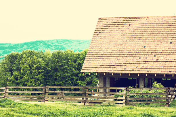 istock Barn, house for animals, barn against the backdrop of mountains. 934416864