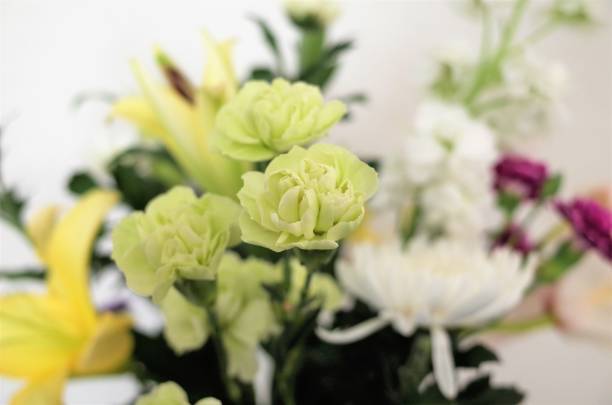 Funeral flowers, statice, lilies, Turkey china, chrysanthemums and stocks stock photo