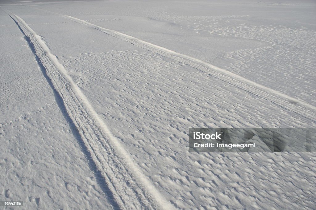 Tire tracks in the snow  Cold Temperature Stock Photo