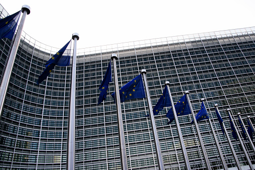 Brussels, Belgium, 4 April 2019 - European Union EU flags in front of the Berlaymont building, headquarters of the European Commission.