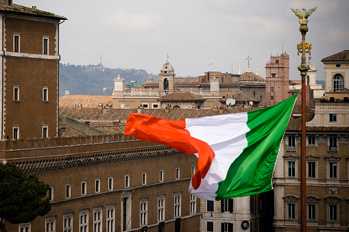 Italian flag in Rome seen from the Vittorio Emmanauel II monument.