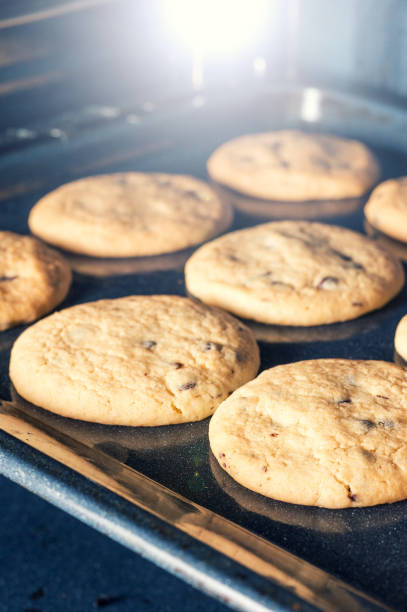 istock Tasty cookies on a baking tray 934431346