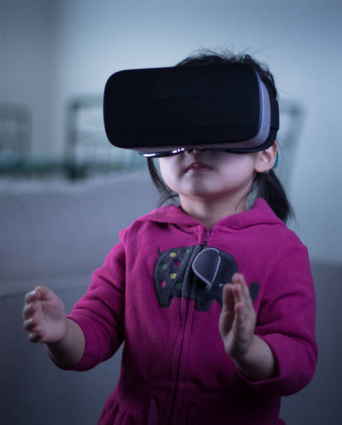 istock Young Asian girl VR headset 934431592