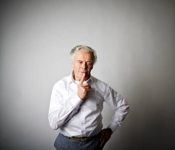 istock Worried. Old man in thoughts. Old man in white. 934437142