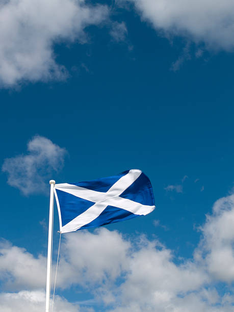 istock Scottish Saltire blowing against the sky 93443933