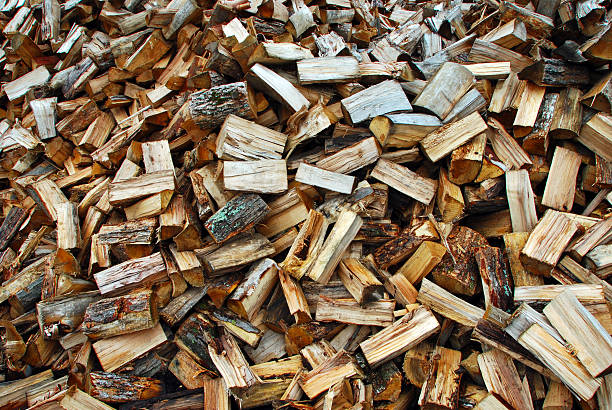 Firewood Pile  fuelwood stock pictures, royalty-free photos & images