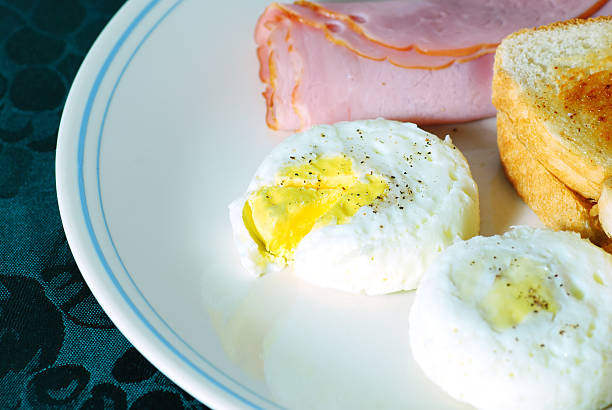 Poached Eggs with ham and Toast  granary toast stock pictures, royalty-free photos & images