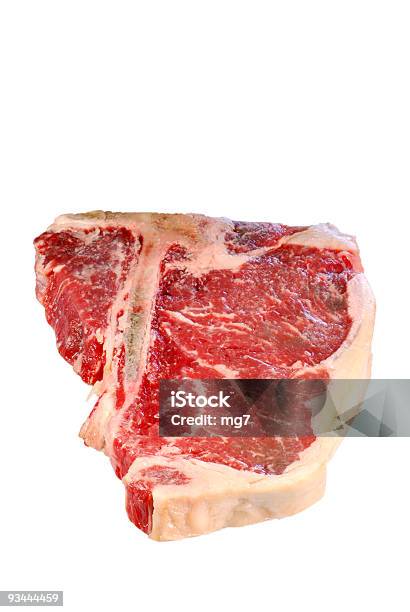 Materias Primas T Bone Steak Foto de stock y más banco de imágenes de Bistec - Bistec, Carne, Corte transversal