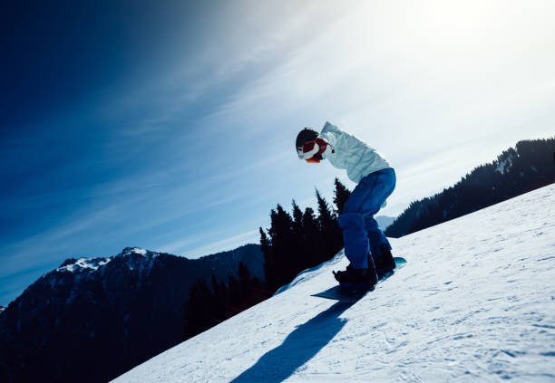 istock one snowboarder snowboarding in winter mountains 934444766