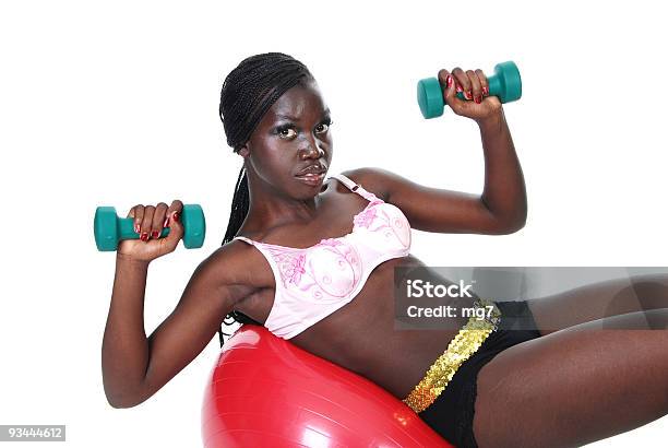 Young Female Working Out With Weights And A Ball Stock Photo - Download Image Now - Adult, African Ethnicity, African-American Ethnicity