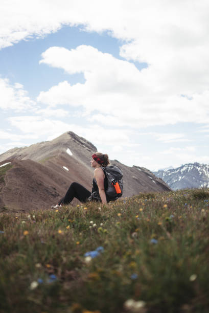 istock Girl on a hiking adventure in the mountains 934446830
