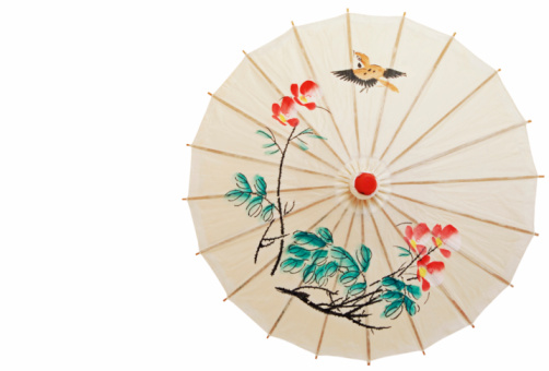 Red japanese umbrella with pattern background. Symbol of protection. Traditional and culture design.
