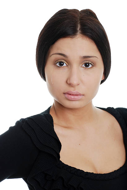istock young hispanic woman sad with a tear 93444783