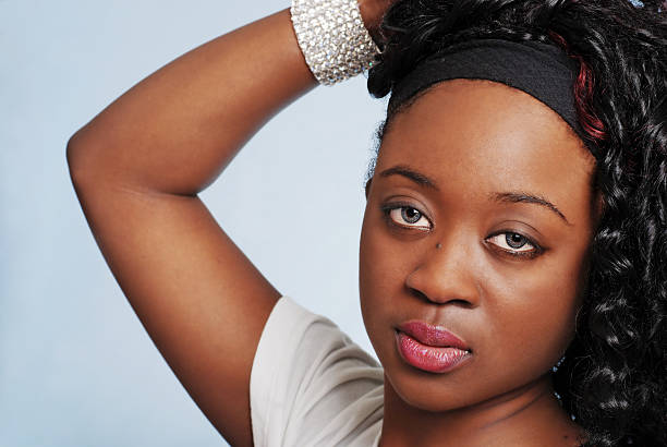 istock Closeup young jamaican woman on blue 93445059