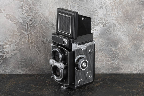 istock The old medium format film TLR camera on cement background. 934473058