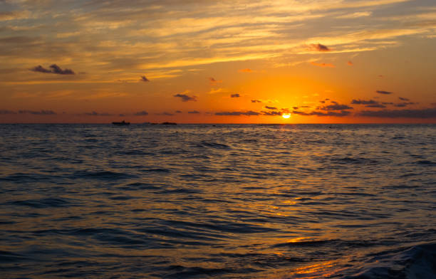 istock Amazing sea sunset, the sun, waves, clouds 934482244