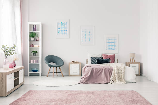 istock Posters in pastel bedroom interior 934492516