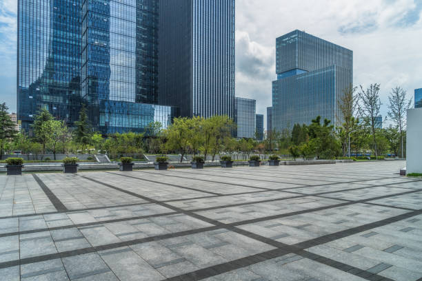 istock Empty brick road nearby office building 934505852
