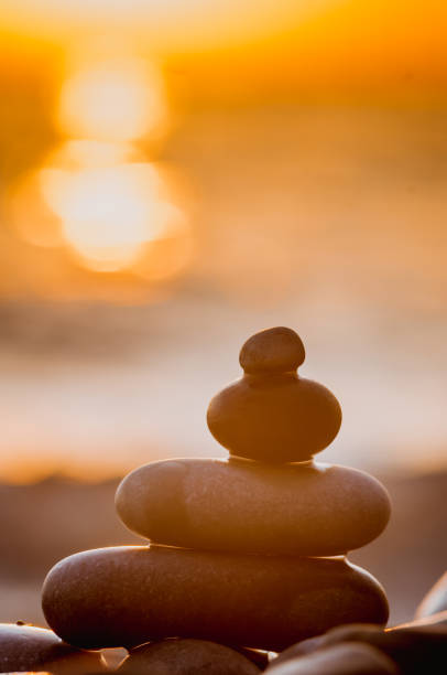istock stack of zen stones on pebble beach 934505978