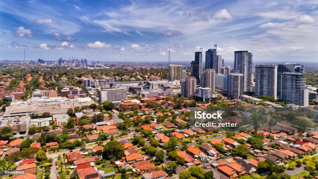 D Chatswood 2 city High Modern urban high-rise towers of Chatswood suburb in Sydney surrounded by residential low houses with red roofs and local streets in view of distant city CBD. House Stock Photo