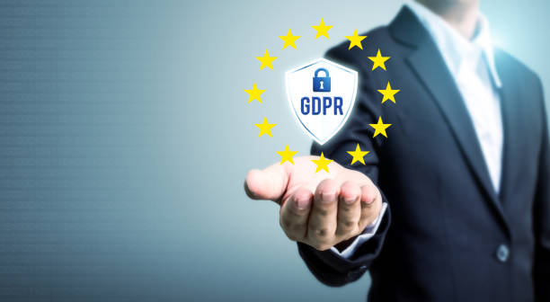 istock Businessman hand holding sign general data protection regulation (GDPR) and shield with key icon 934521162