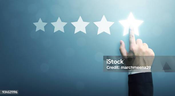 Hand Of Businessman Touching Five Star Symbol To Increase Rating Of Company Concept Copy Space Background For Your Title Stock Photo - Download Image Now
