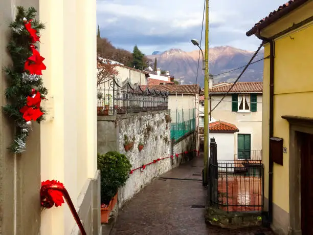 Street in the village on the island of Iseo decorated for Christmas