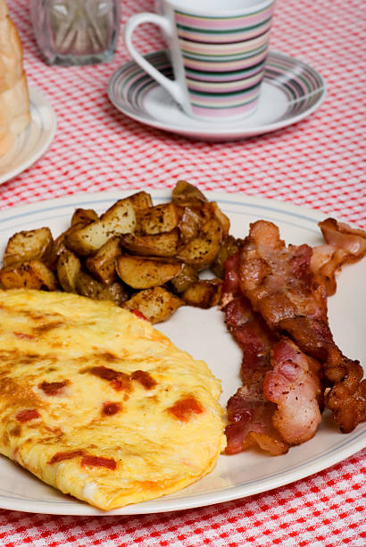 istock Omelet with red peppers bacon and home fries 93454171