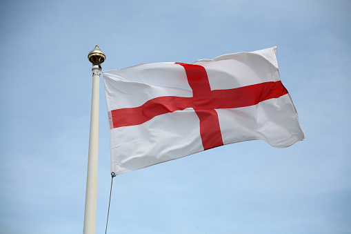 England St George flag blowing in the wind on a fine day.