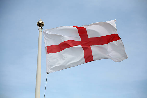 Close up of St George flag waving from flag post stock photo