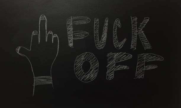 istock drawn middle hand with the text: FUCK OFF. 934564216