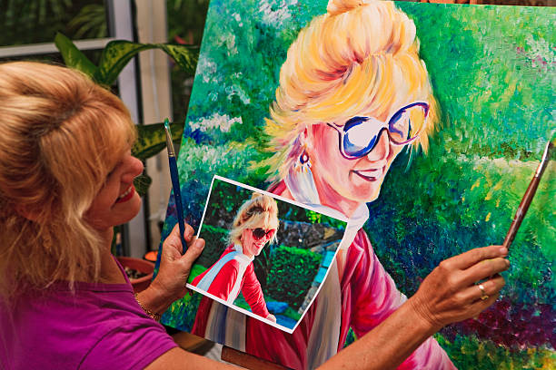 artist painting a self-portrait  self portrait stock pictures, royalty-free photos & images