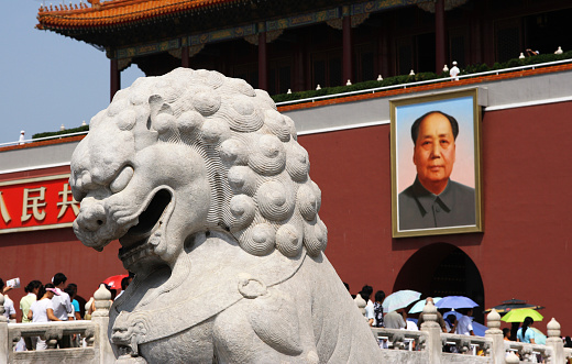 Tian 'anmen and Huabiao in Beijing, ChinaQianmen Gate on Tiananmen Square and the entrance to the Palace Museum in Beijing (Gugun).Inscription-Long live the People's Republic of China! Long live the solidarity of the peoples of the world! Tiananmen square in Beijing, China