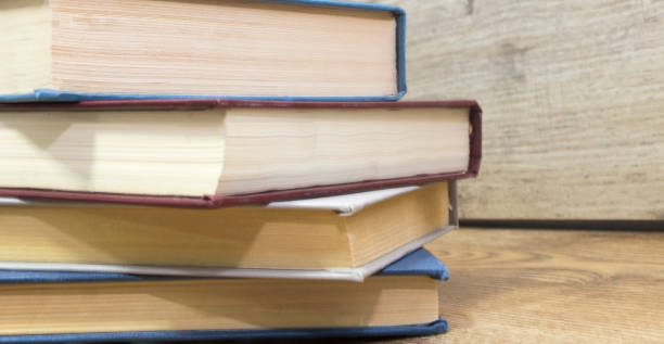 istock Front view of old books lying on the table. 934588192