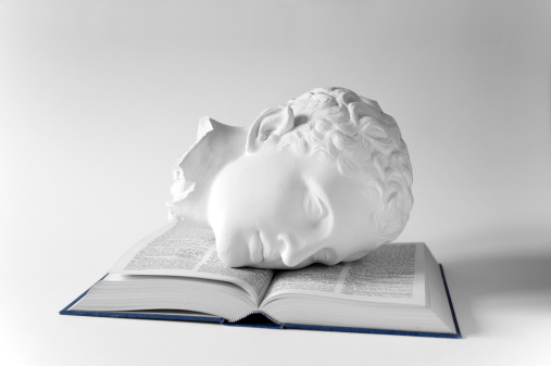 Classical head on open book